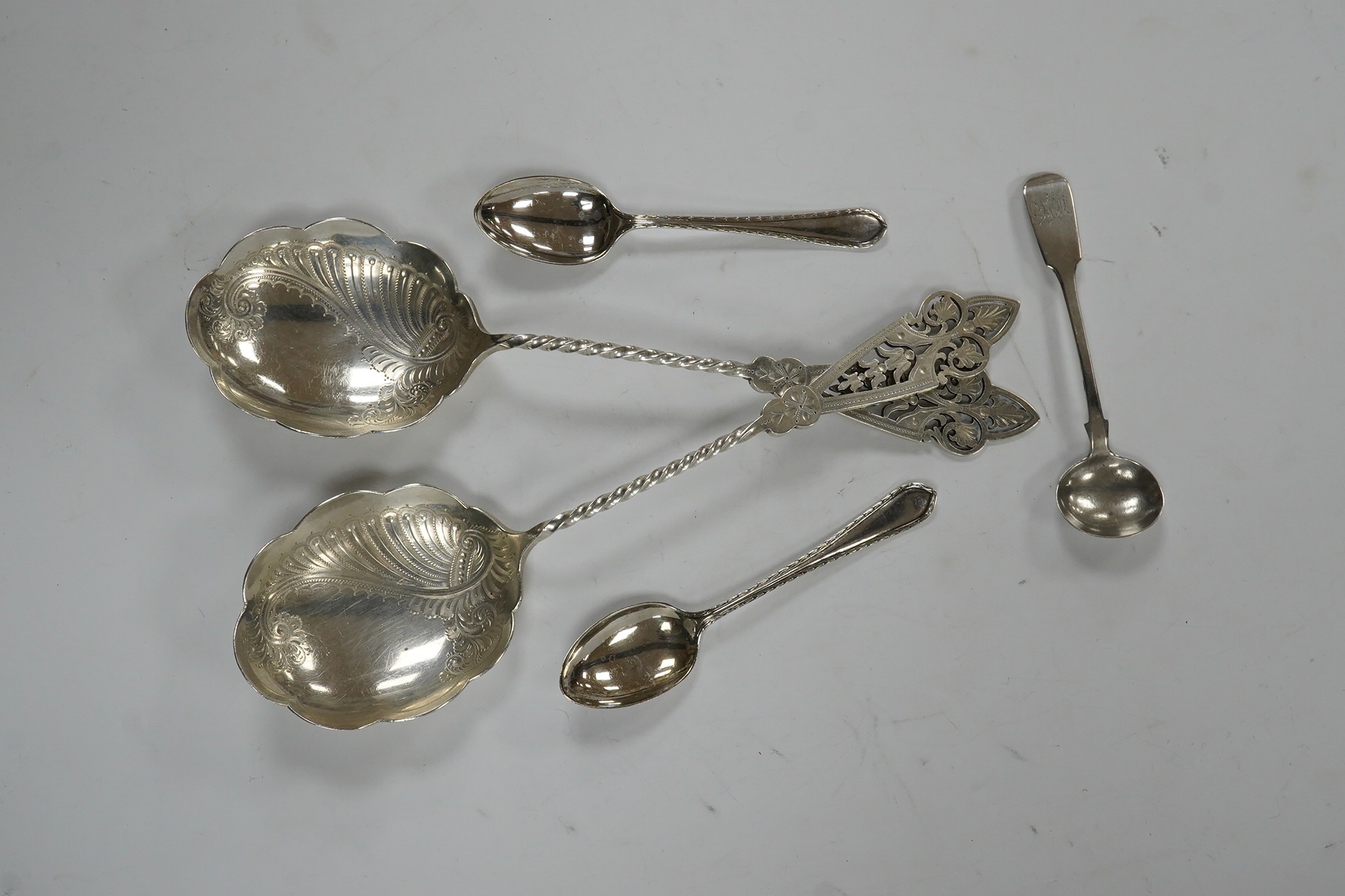 A pair of Edwardian silver serving spoons, Sheffield, 1901, 21.6cm and a quantity of assorted minor silver flatware. Condition - poor to fair